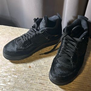 Black Nike Jordan 4s